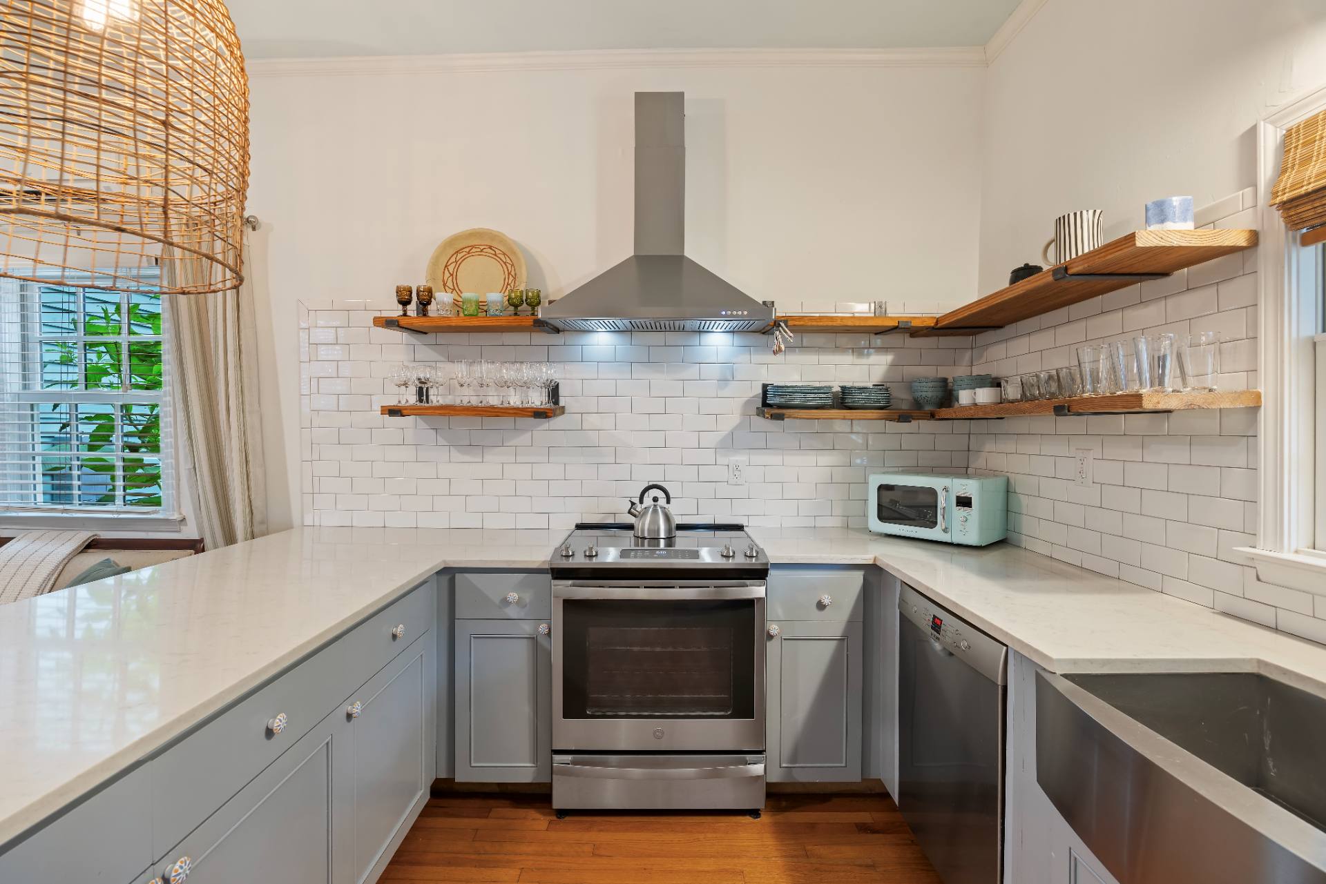 Suite A kitchen range and open shelving
