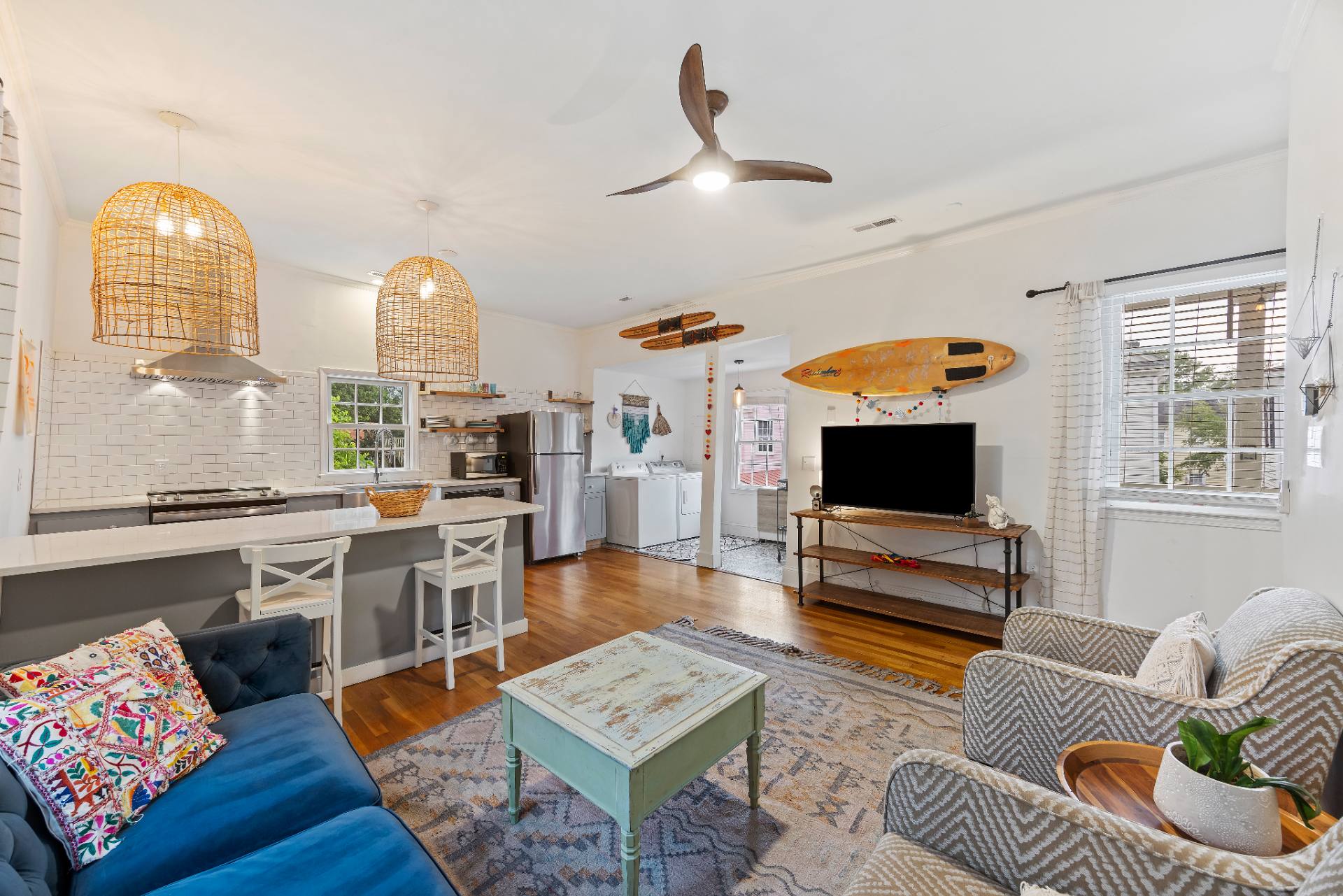 Suite B living room with surfboard