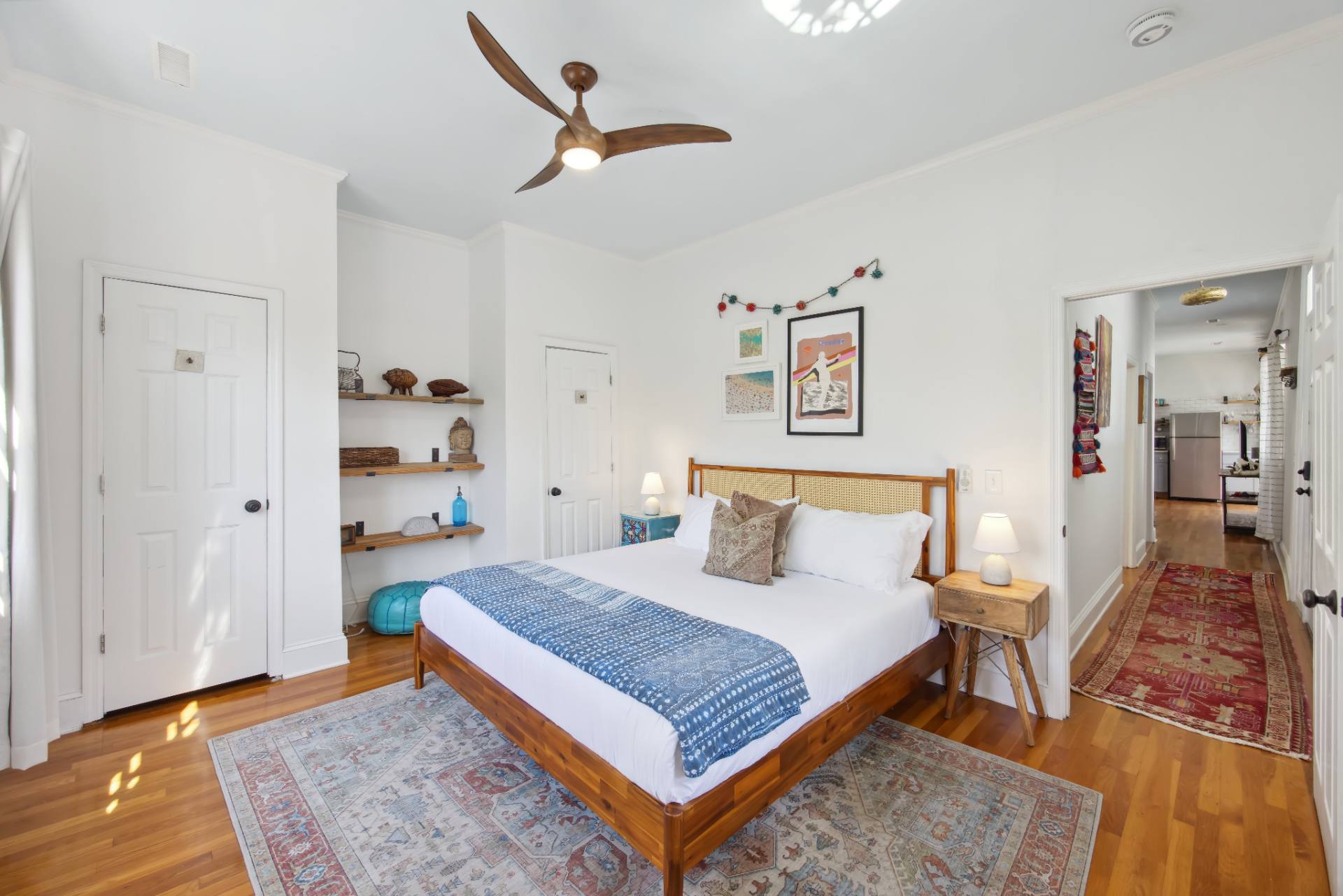 Suite B king bedroom with cane headboard