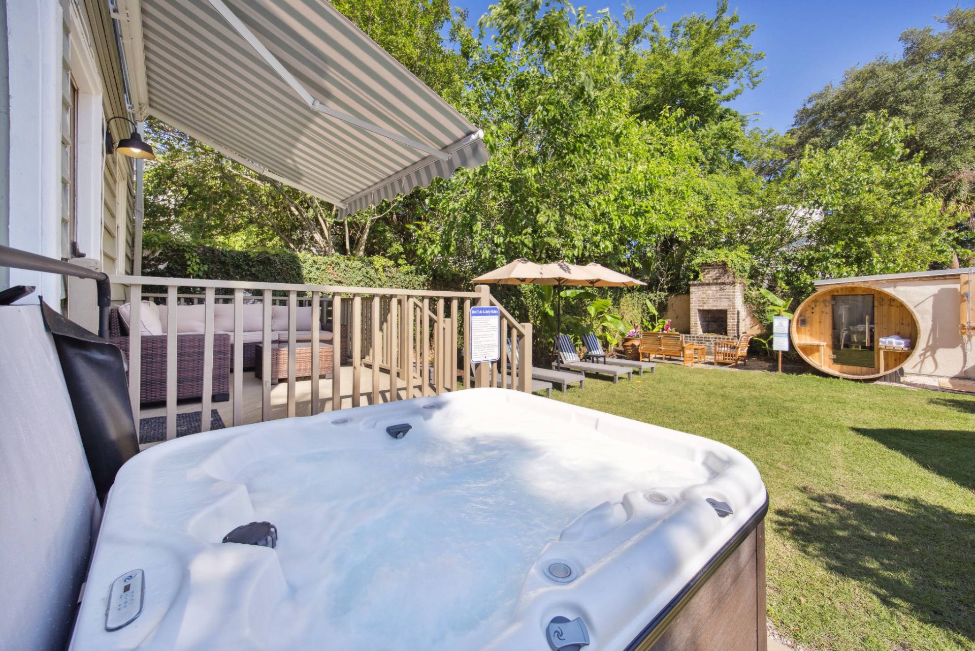View past the hot tub into the wellness yard
